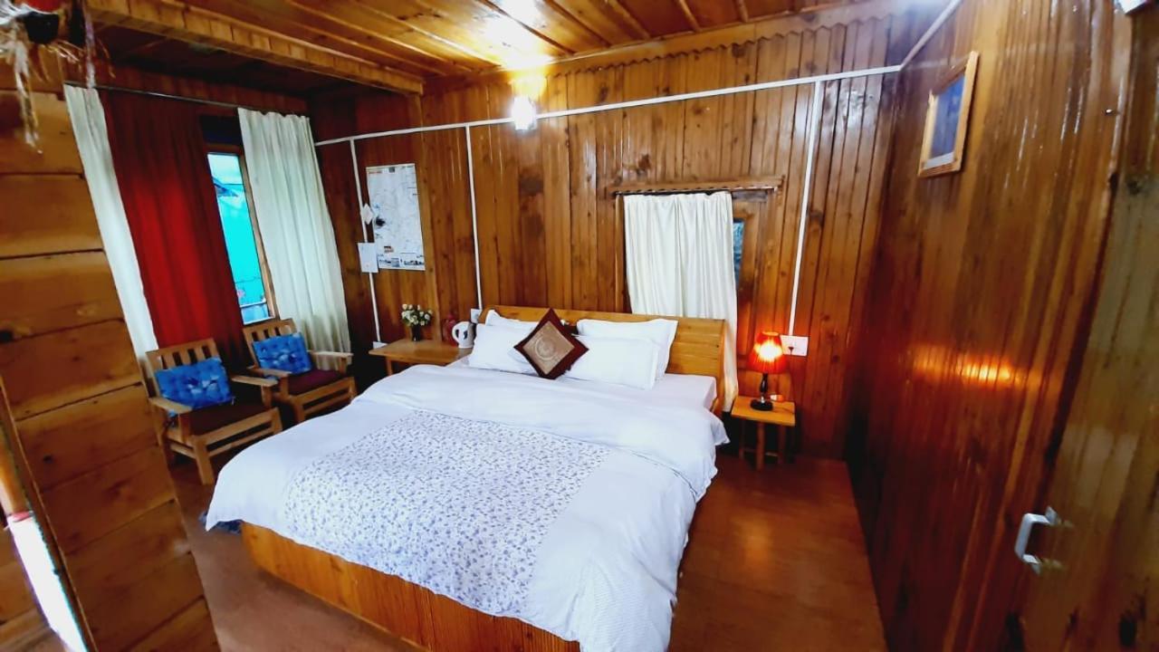Ishan Log Huts-A Boutique Home Stay Banjār Kültér fotó