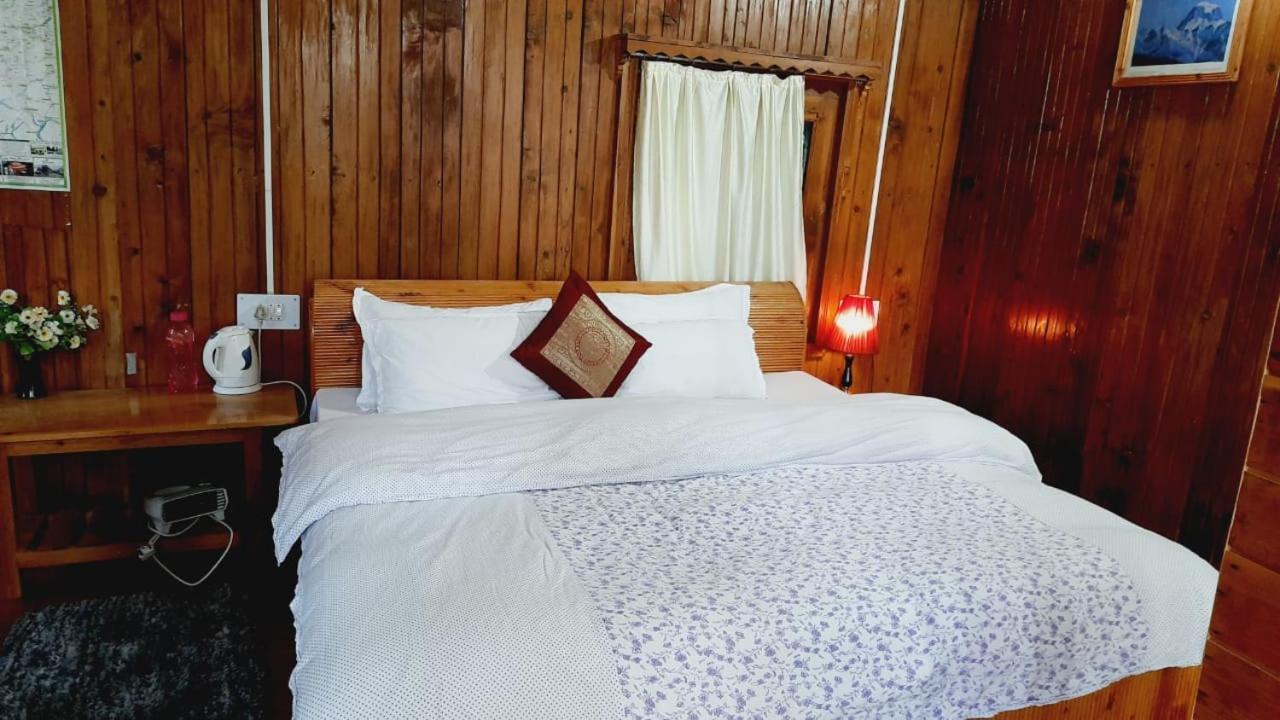 Ishan Log Huts-A Boutique Home Stay Banjār Kültér fotó