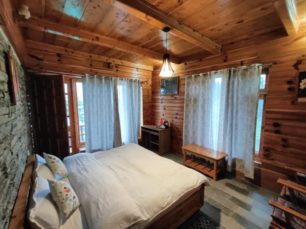 Ishan Log Huts-A Boutique Home Stay Banjār Kültér fotó